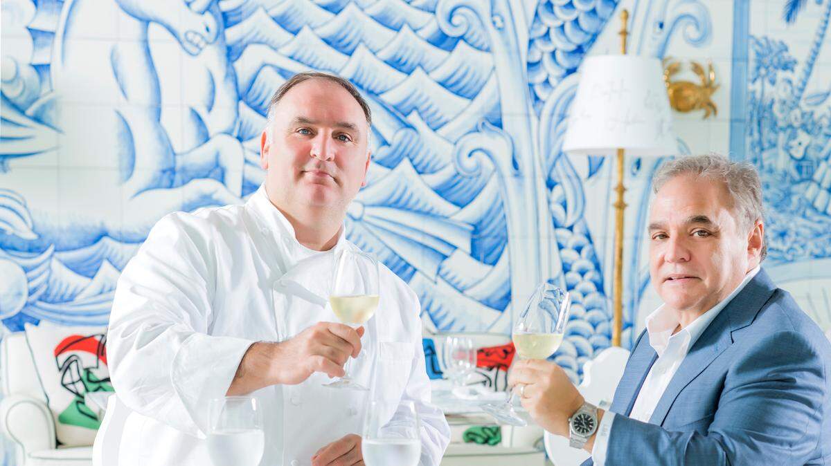 Lee Brian Schrager and chef Jose Andres raise a glass at Bazaar Mar at SLS Brickell.