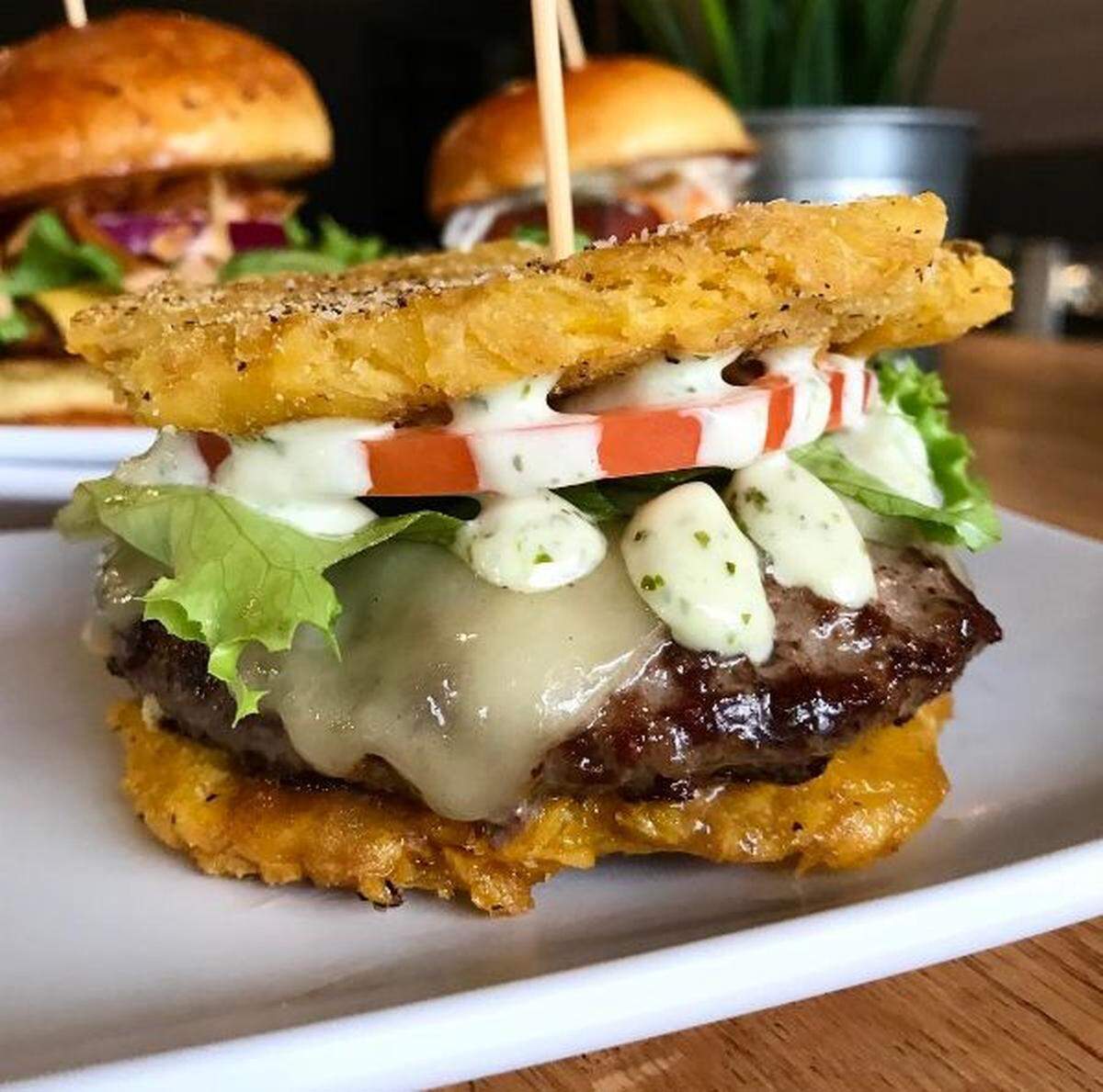 Pincho Factory's toston burger is one of the most-Miami burgers around.