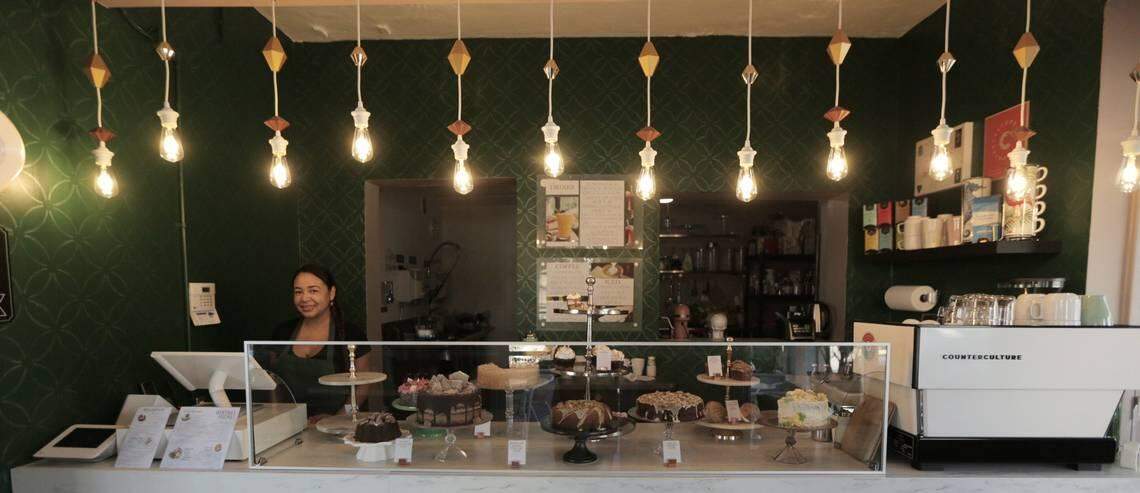 Yurmir Gonzalez works at the the main counter in La Social, a new Miami restaurant opened by Ivan Nieves and husband David Flores, who left Puerto Rico after Hurricane Maria destroyed their home there.