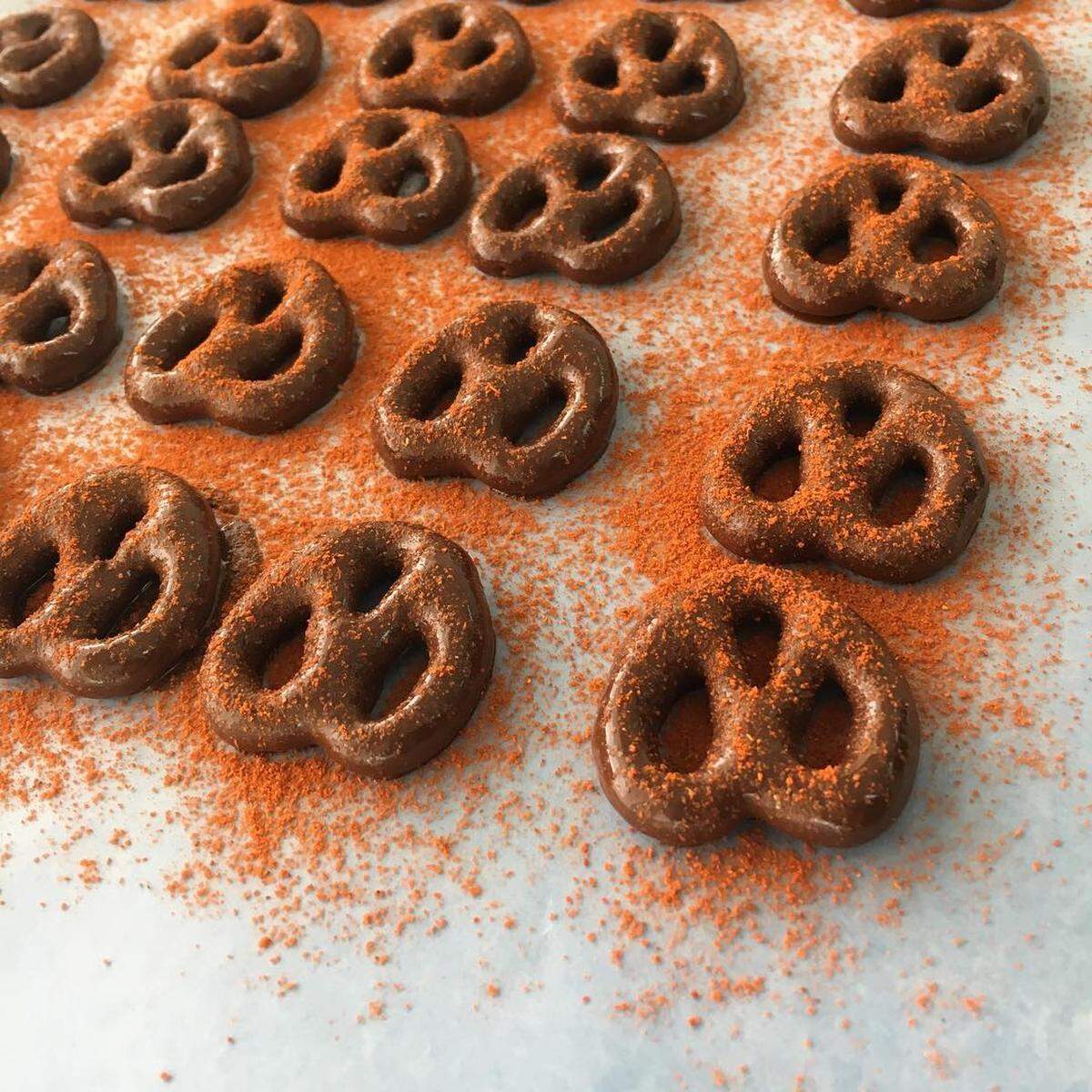 Chocolate-covered pretzels are dusted in cinnamon and ginger at Bon Chocolatier
