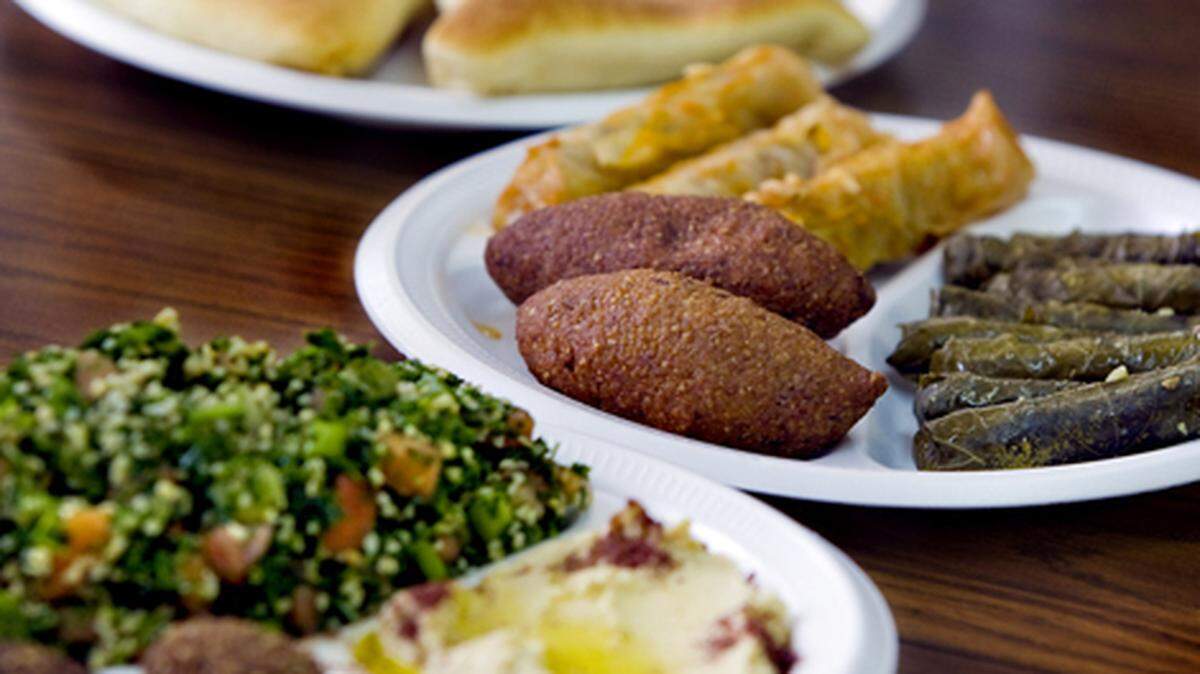 A variety of Middle Eastern snacks at Ali Aziz's with Middle East Best Food.