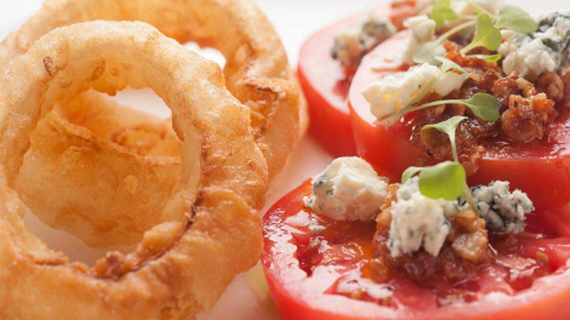 Tomato salad photo via Quality Meats NYC.