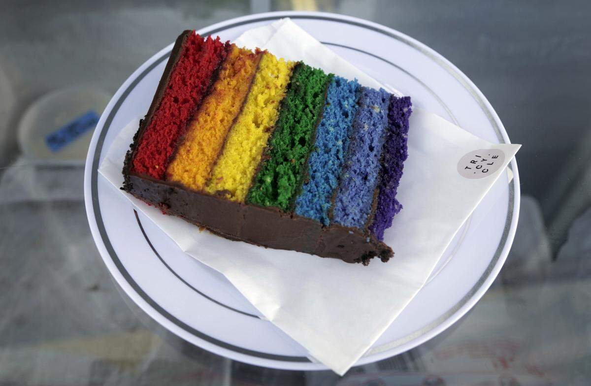 A pice of Roy G BIV lemon sponge cake, soaked in vanilla and almond with cherry jam and topped with Valrhona chocolate. It's one of the treats at the new Tricycle Ice Cream.