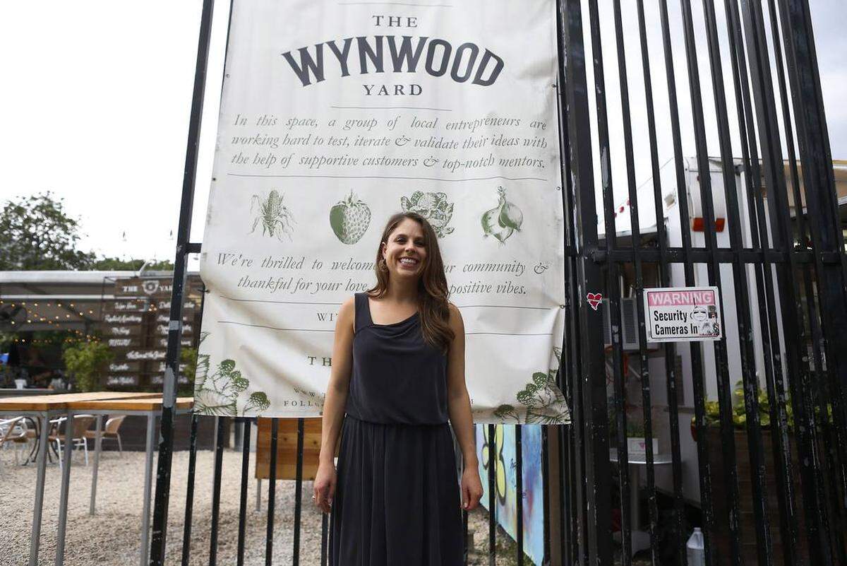 Della Heiman, founder and CEO of The Wynwood Yard, stands in front of the open-air culinary incubator on June 7, 2017 in Miami.