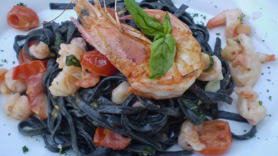 A special of squid ink ferrucine with shrimp, tomatoes and bastil at Ni.Do Mozzarella Bar, MiMo district on Biscayne Boulevard.