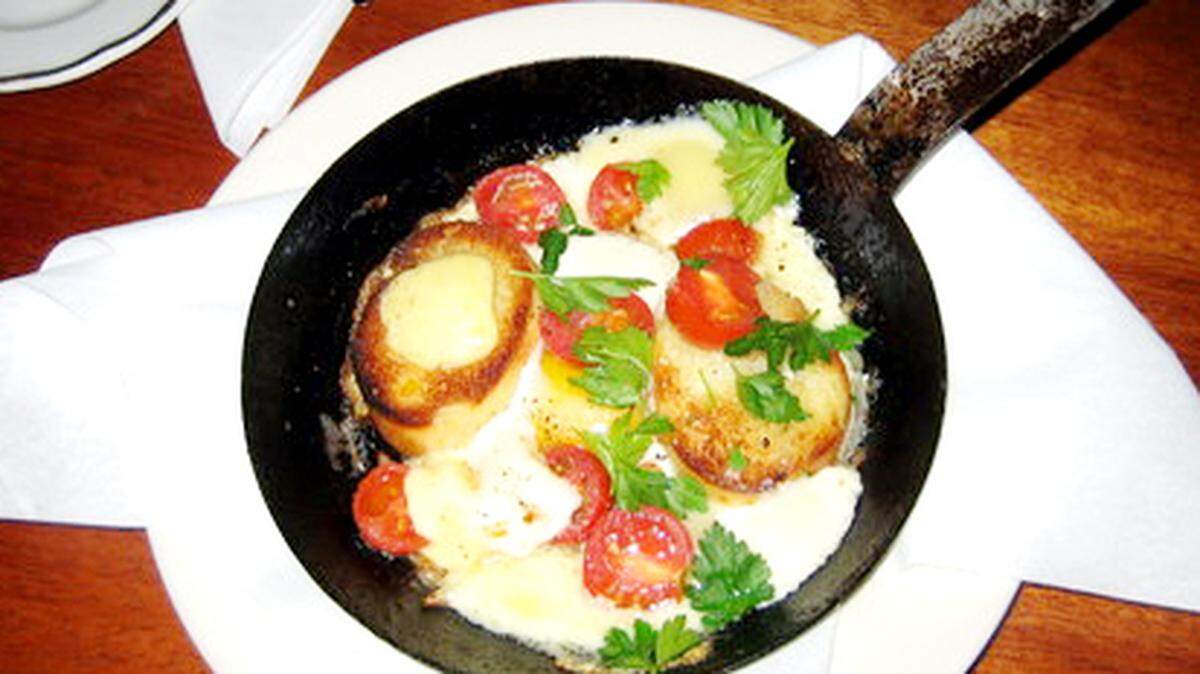Organic egg, morbier cheese and tomato toast ($8).