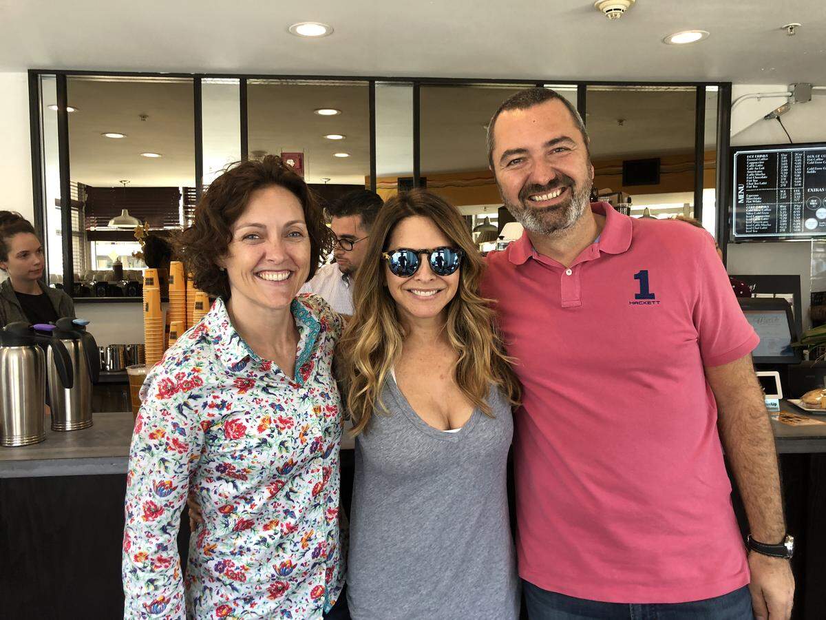 Chef Ingrid Hoffman (center) stopped in to try South Florida's first Kahwa Coffee and to take pictures with the founders, Raphael and Sarah Perrier