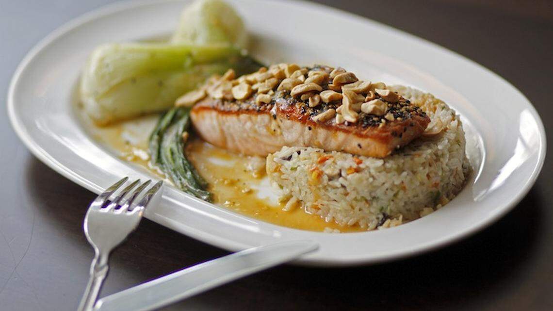 SPICY GRILLED SALMON: With couscous, bok choy and a miso glaze.