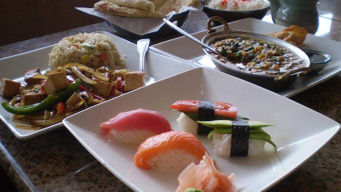 Kosher rice noodles, fried rice,  and lentil dal  at Thai Treat Thai, Indian and Sushi in North Miami.