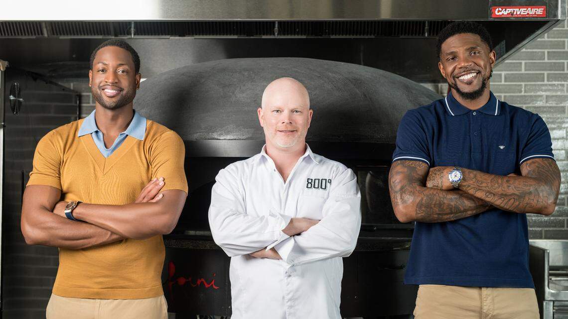 Dwyane Wade and Udonis Haslem with Chef Anthony Carron.