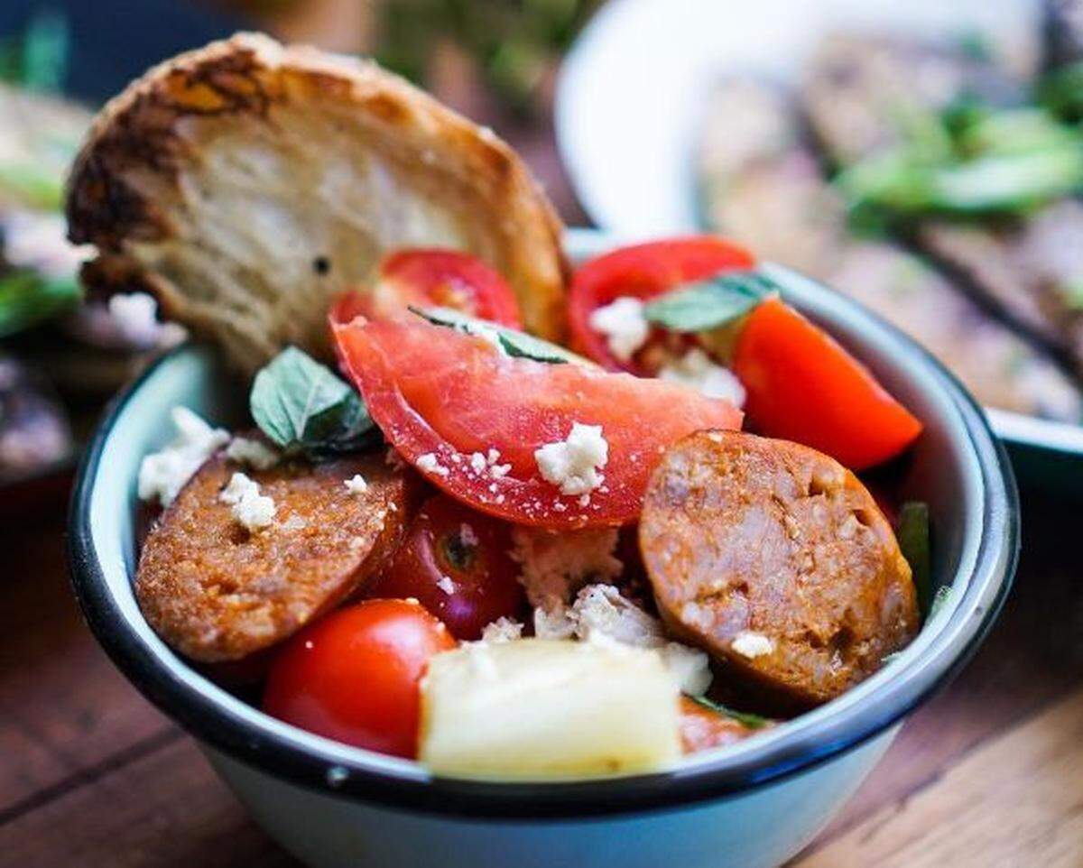 Tomato and chorizo salad with rustic bread at Sherwood Bistro.