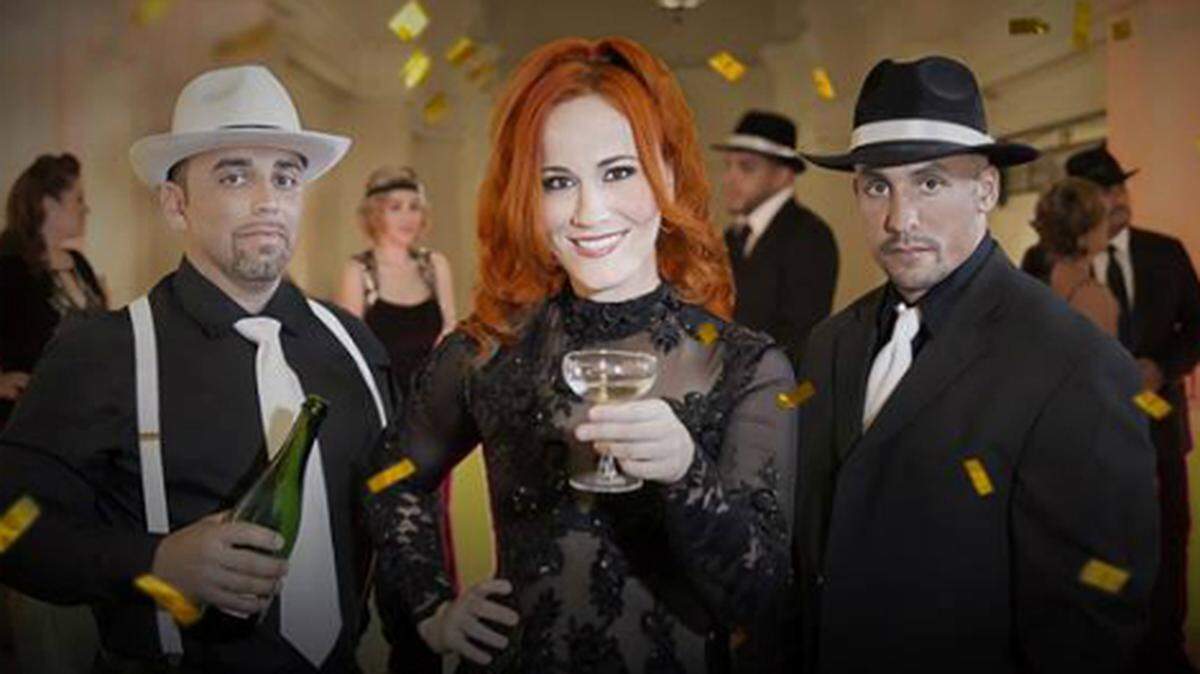 Chef Adrianne (center) hosts an Eve of Prohibition ball on Oct. 23.