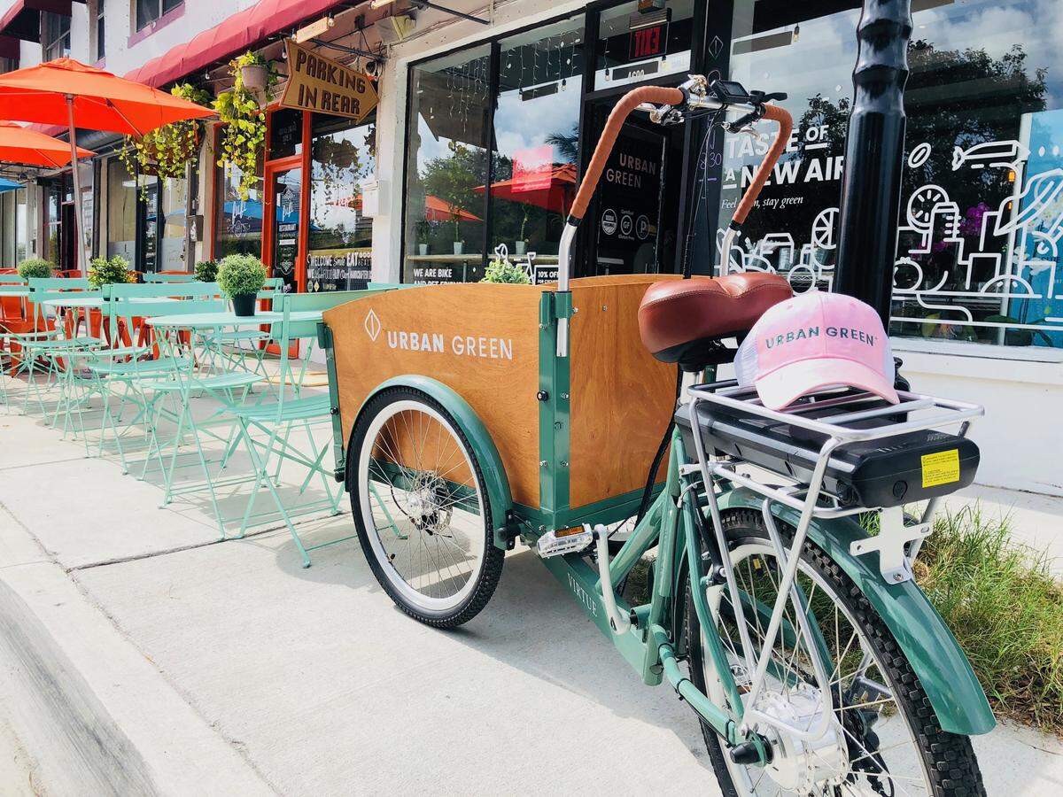 Electric bikes make deliveries around the Design District.