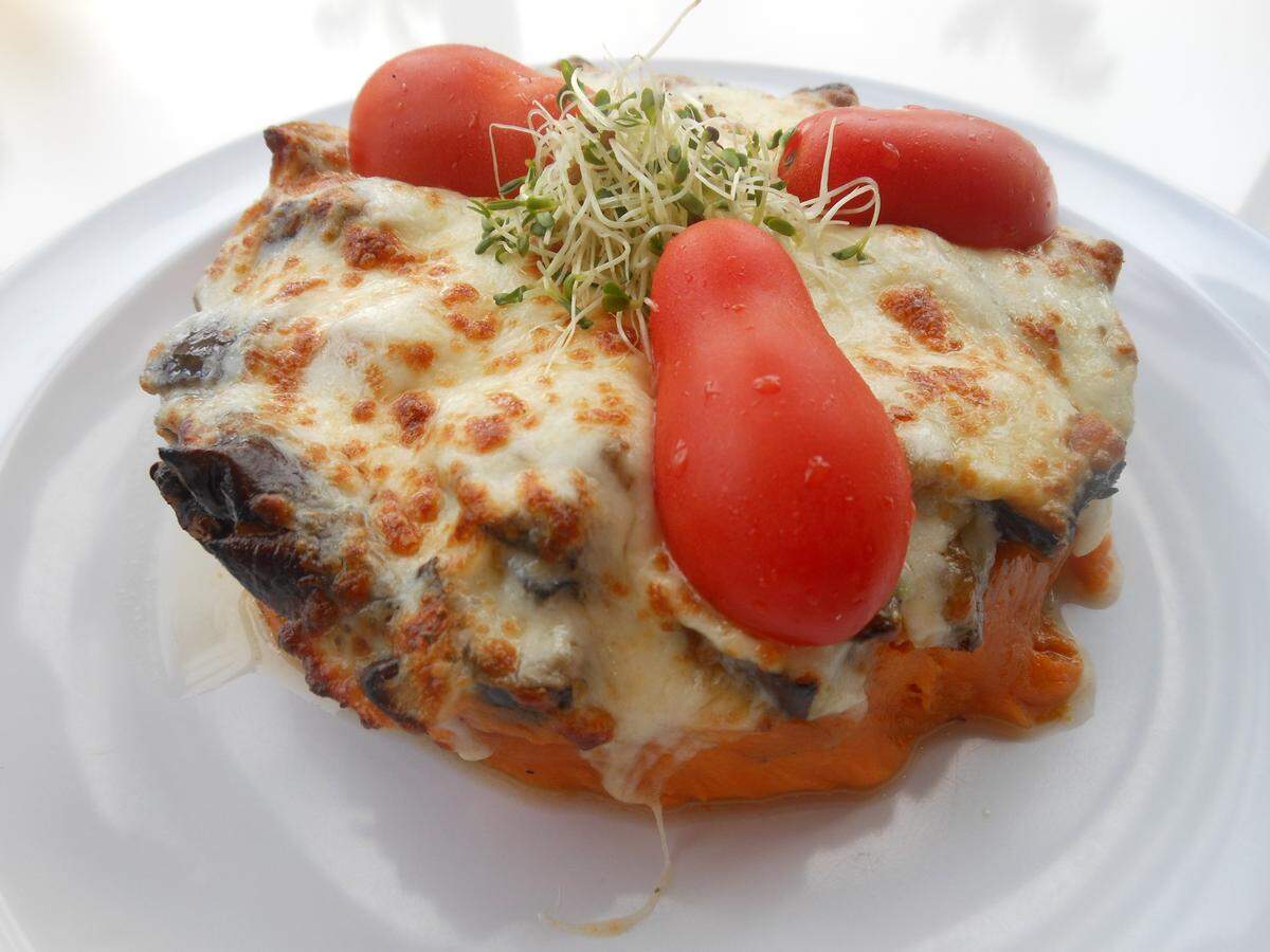 Mashed sweet potato stuffed with roasted eggplant and melty cheese at Carrot Express