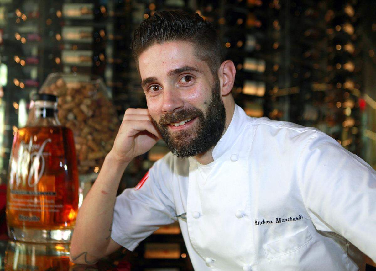 Chef Andrea Marchesin pose for the photo at Toscana Divino Italian restaurant in Miami Beach on Wednesday, Dec. 21, 2016.