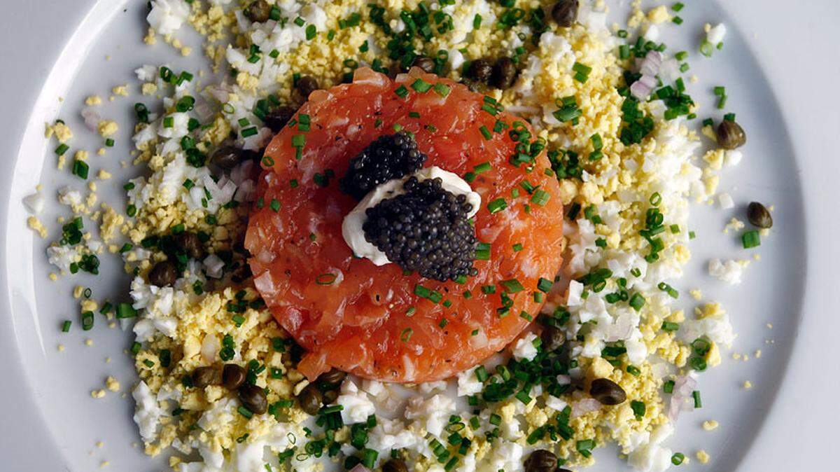 This dish shot of Saumon Tartare with capers, onions, eggs, creme Fraiche, and cavier. Photo: Carl Juste.