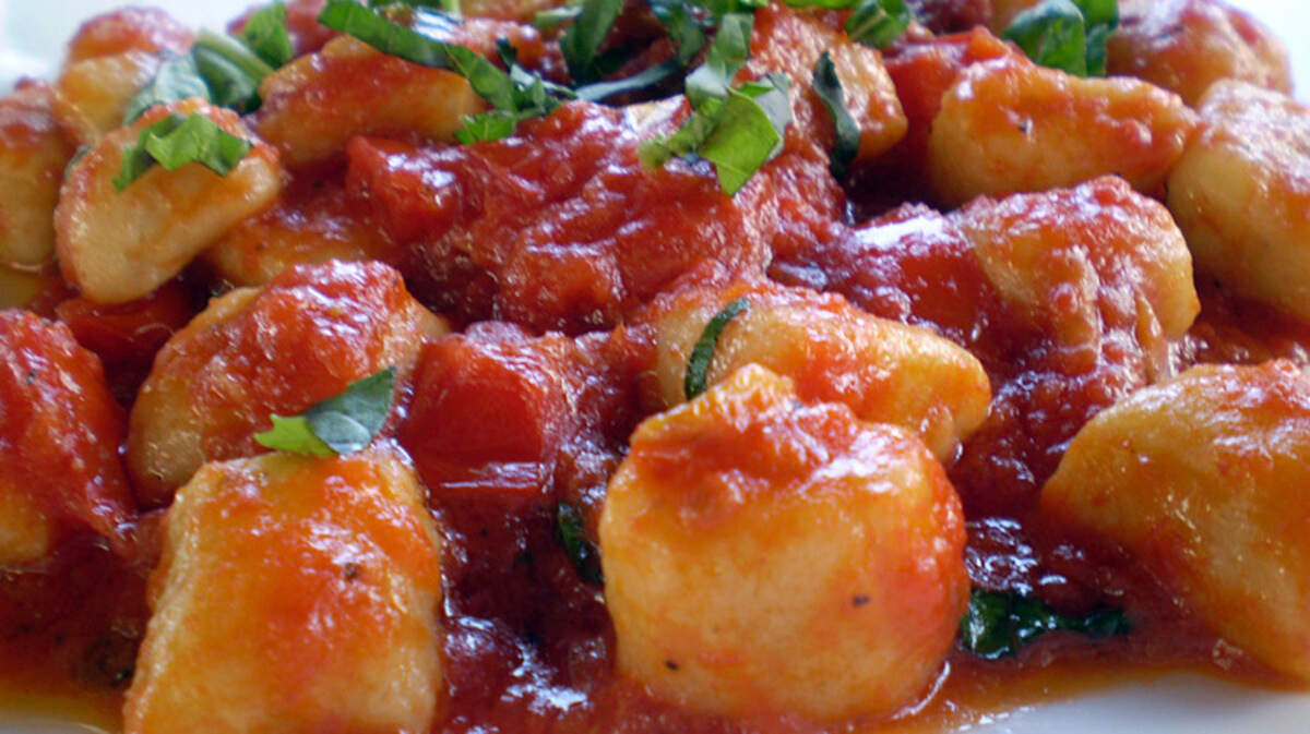Homemade potato gnocchi with tomato sauce and basil at Bellini Italian Bistro in Miami Beach.