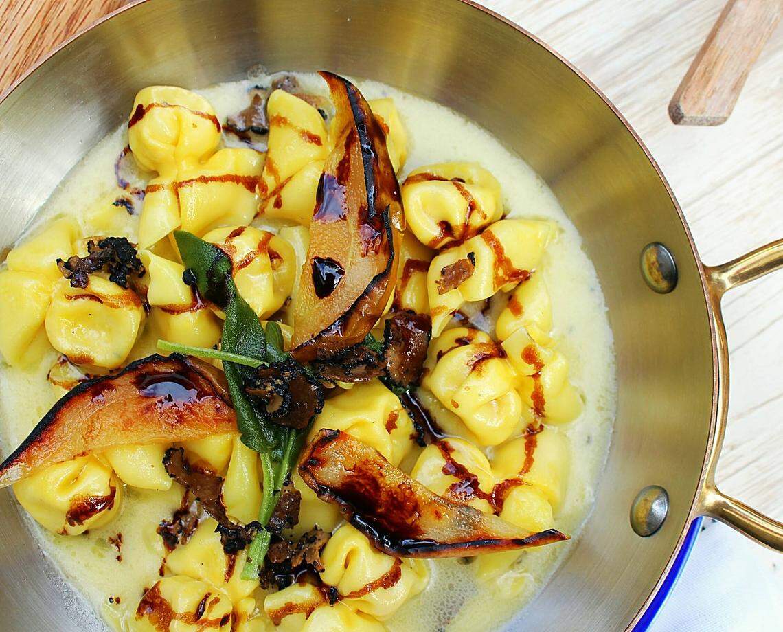 Fiocchetti pasta purses stuffed with truffle cream tossed in Parmigiano-Reggiano fondue sauce at Call Me Gaby.