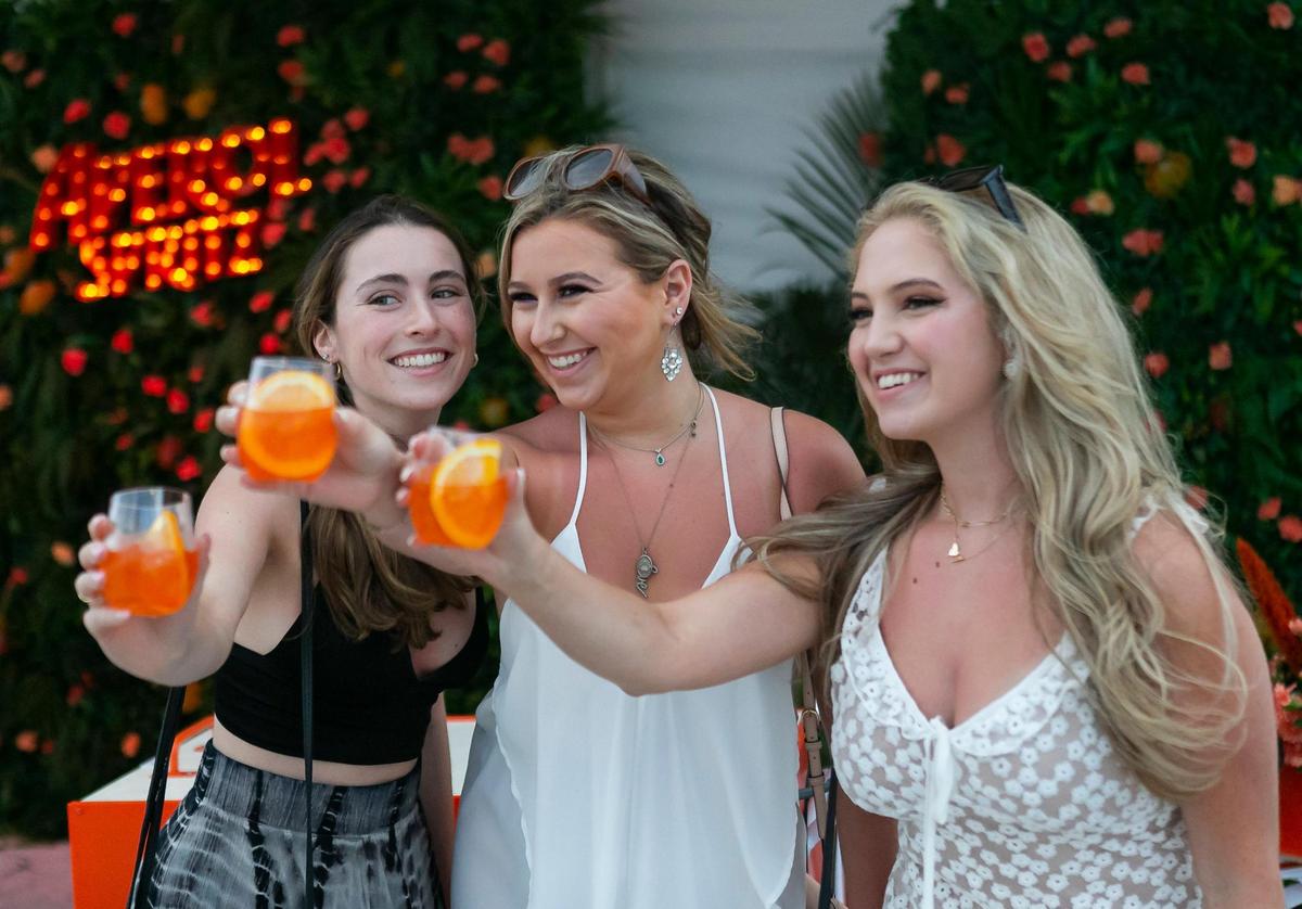 From left to right; Rachel Shanahan, Rachel Dagen and Sierra Basquez attend the South Beach Wine and Food Festival Italian Bites on the Beach kickoff event in Miami Beach, Florida on Thursday, May 20, 2021.