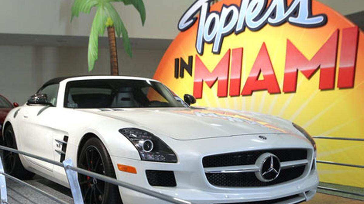 A high end convertables awaits the public veiwing at the Miami International Auto Show. Photo. C.W. Griffin