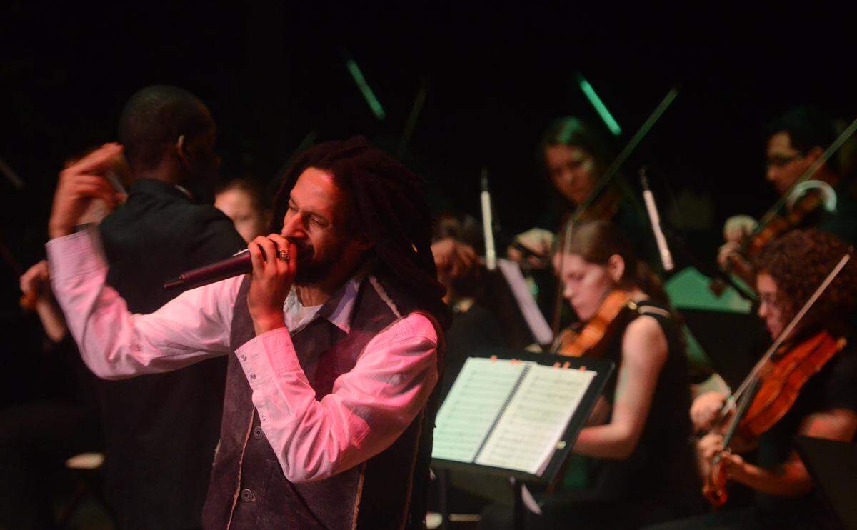 Julian Marley performs with students from the Frost School of Music during the 2nd Annual Charitable Fundraiser Event, 'The Journey', presented by The Omeriah Malcolm Music Foundation at Pinecrest Gardens on Thursday, Nov. 29, 2012 in Miami, Fla. The proceeds of the event will provide music education and equipment for underprivileged children in Ethiopia, South Florida, Jamaica and several other countries.