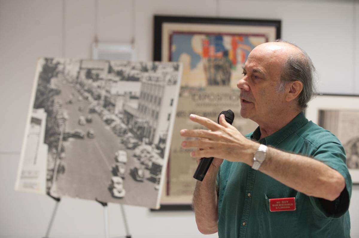 Miami Beach historian Seth Bramson about the early development of the area during a free lecture at the Art Deco Welcome Center, Tuesday, Oct. 7, 2014, in Miami Beach. Dozens of people turned out for the event, which was presented by the Miami Beach Preservation League.