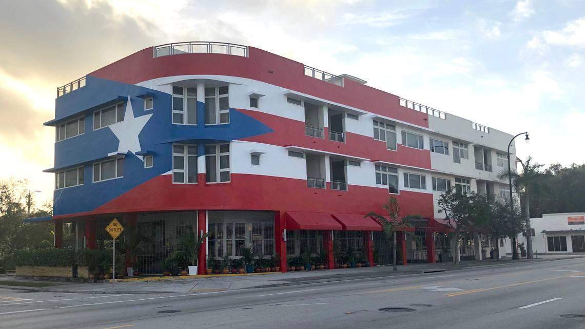 The building that houses La Placita restaurant has a mural of the Puerto Rican flag on the exterior, which caused controversy.