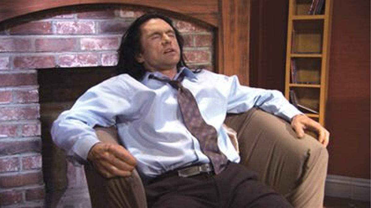 Tommy Wiseau as Johnny in 'The Room,' possibly the worst film ever made.