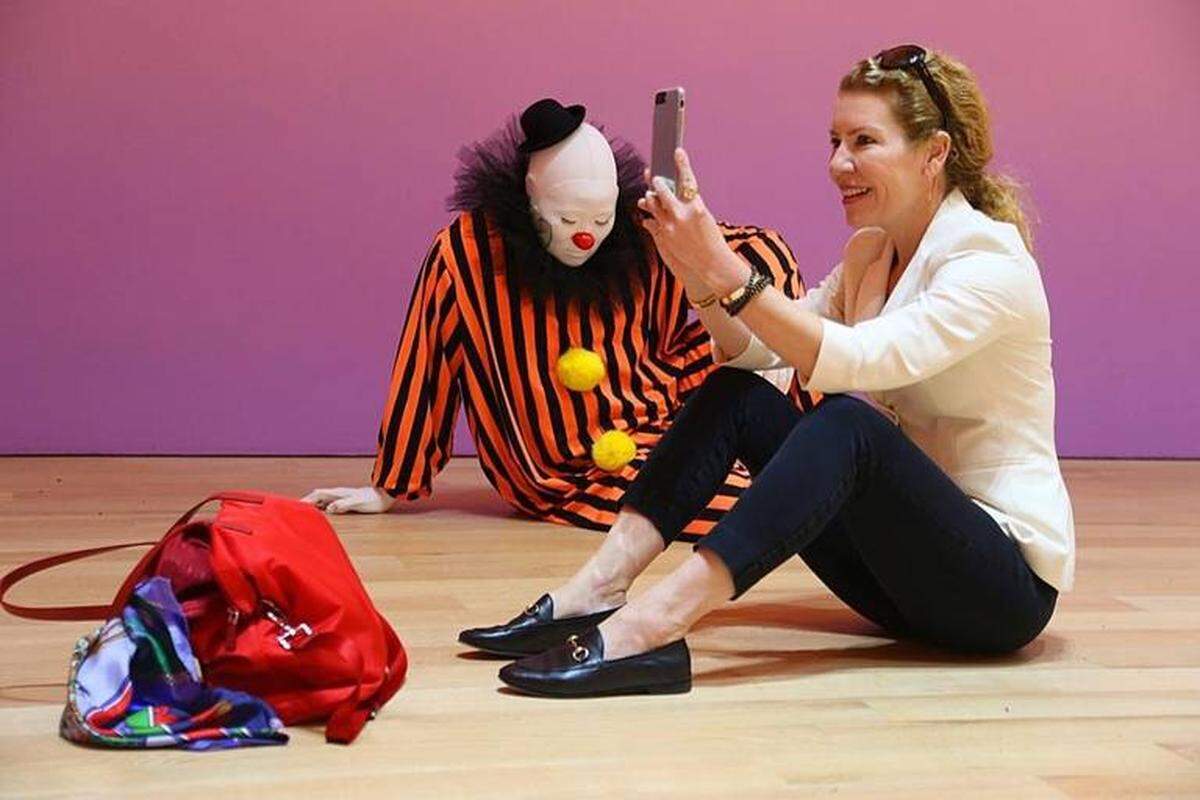 Donor Susan Ainsworth takes a quick selfie among the clowns. She was never seen again.