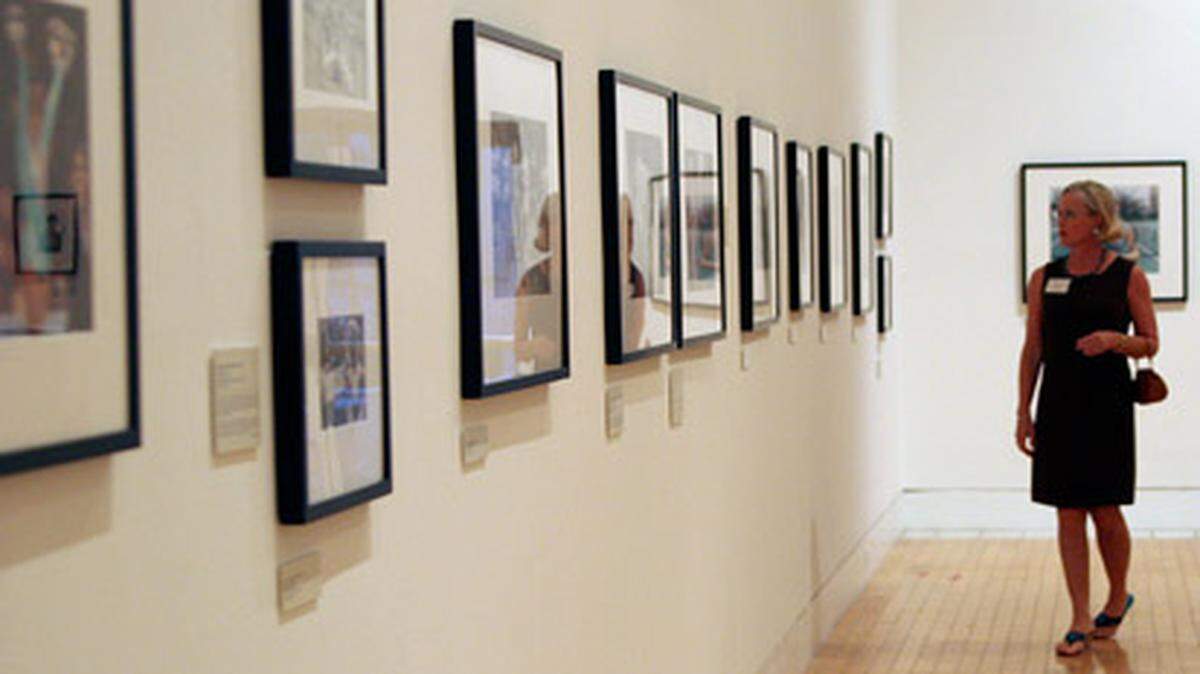 Vickie Estler walks through an exhibit at the Lowe Art Museum at the University of Miami.