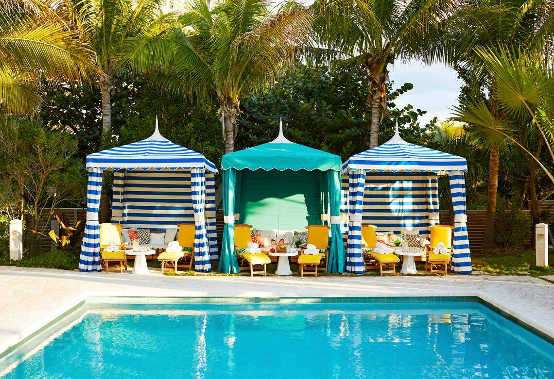 Lounge poolside in one of the cabanas at The Confidante.
