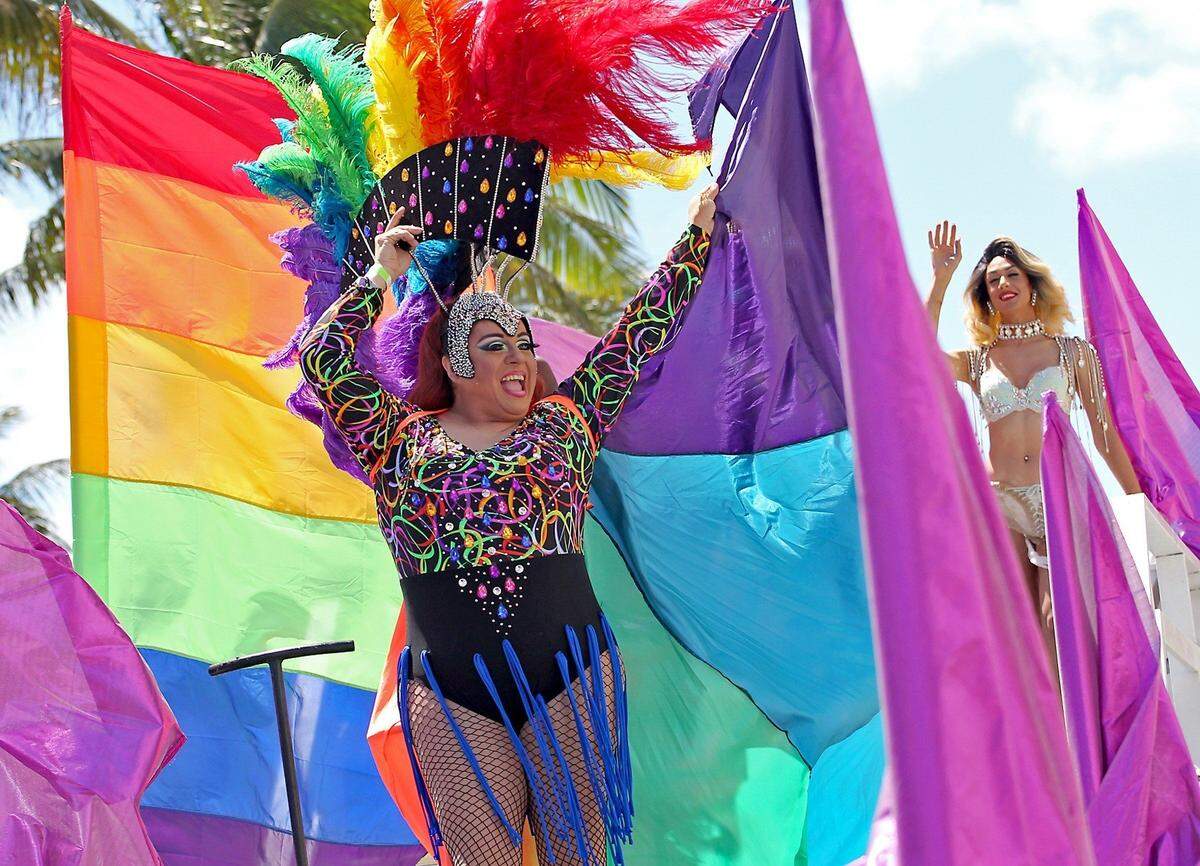 Costumed entertainers engage the crowd at the annual Miami Beach Gay Pride Parade and Festival on Sunday, April 10, 2016.