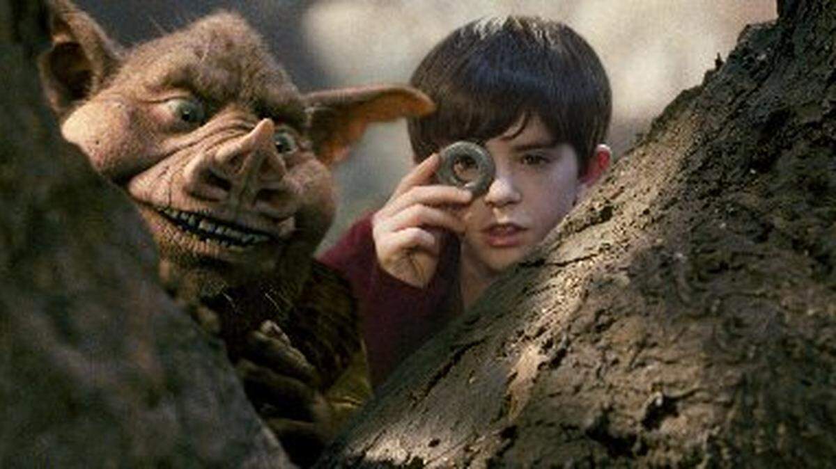 Hogsqueal (Seth Rogen) helps Jared Grace (Freddie Highmore) spy on the wicked creatures in 'The Spiderwick Chronicles.'
