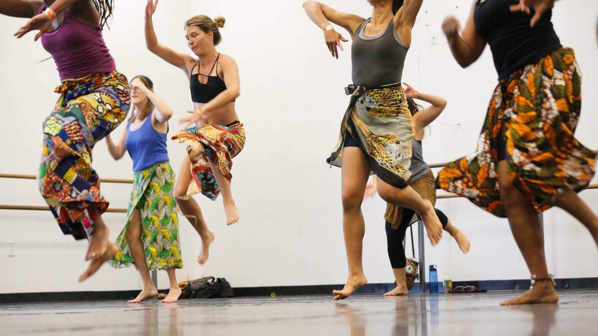 Festival goers enjoy the Senegal Dance Workshop at the African Diaspora Dance &amp; Drum Festival at the Little Haiti Cultural Complex on Saturday, Aug. 6.