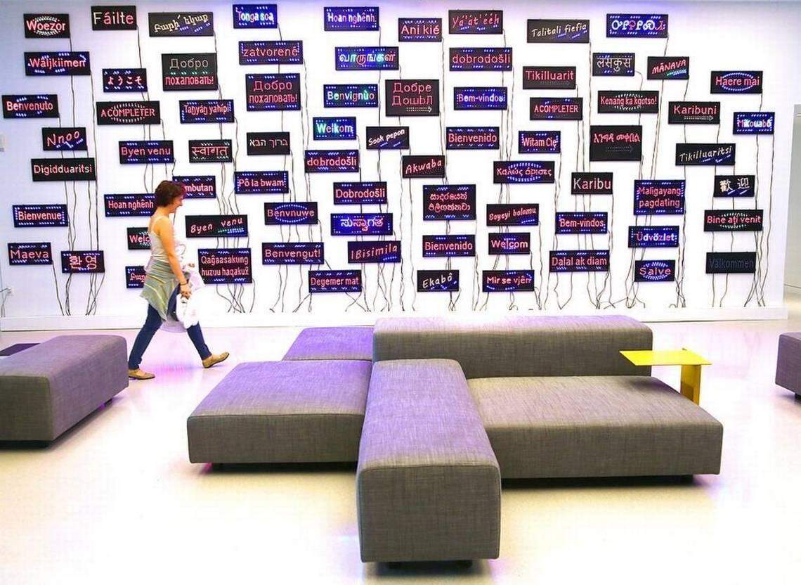 The lobby installation  by artist Pascale Marthine Tayou features the word "welcome" in different languages.