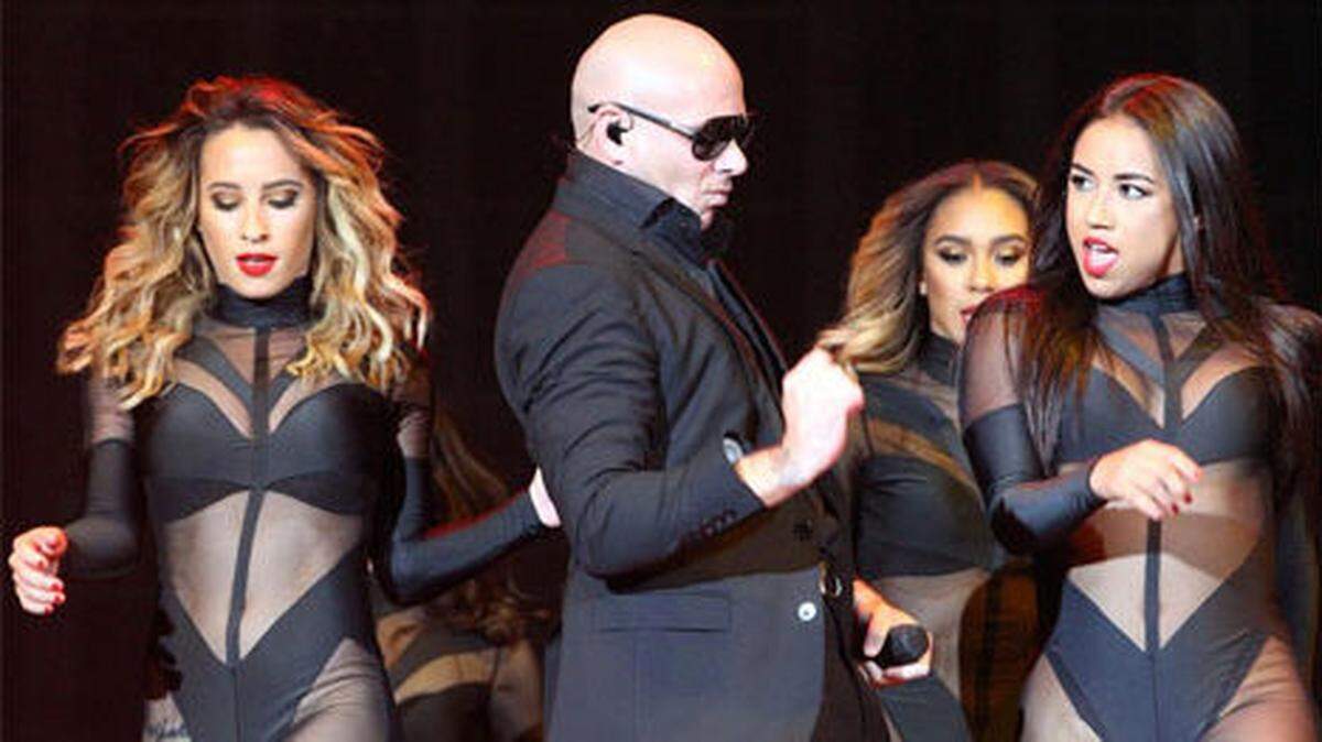 Being able to wear black is a key component of working for Pitbull.