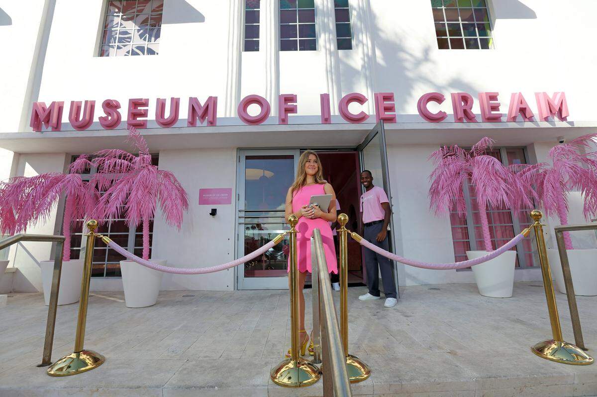 Taylor Thompson welcomes visitors to The Museum of Ice Cream at 3400 Collins Ave. in Miami Beach, during Art Basel week in Miami, Thursday,, Dec. 7, 2017. The museum offers guests the chance to taste, smell, swing and even swim in all things ice cream. (Emily Michot/Miami Herald)