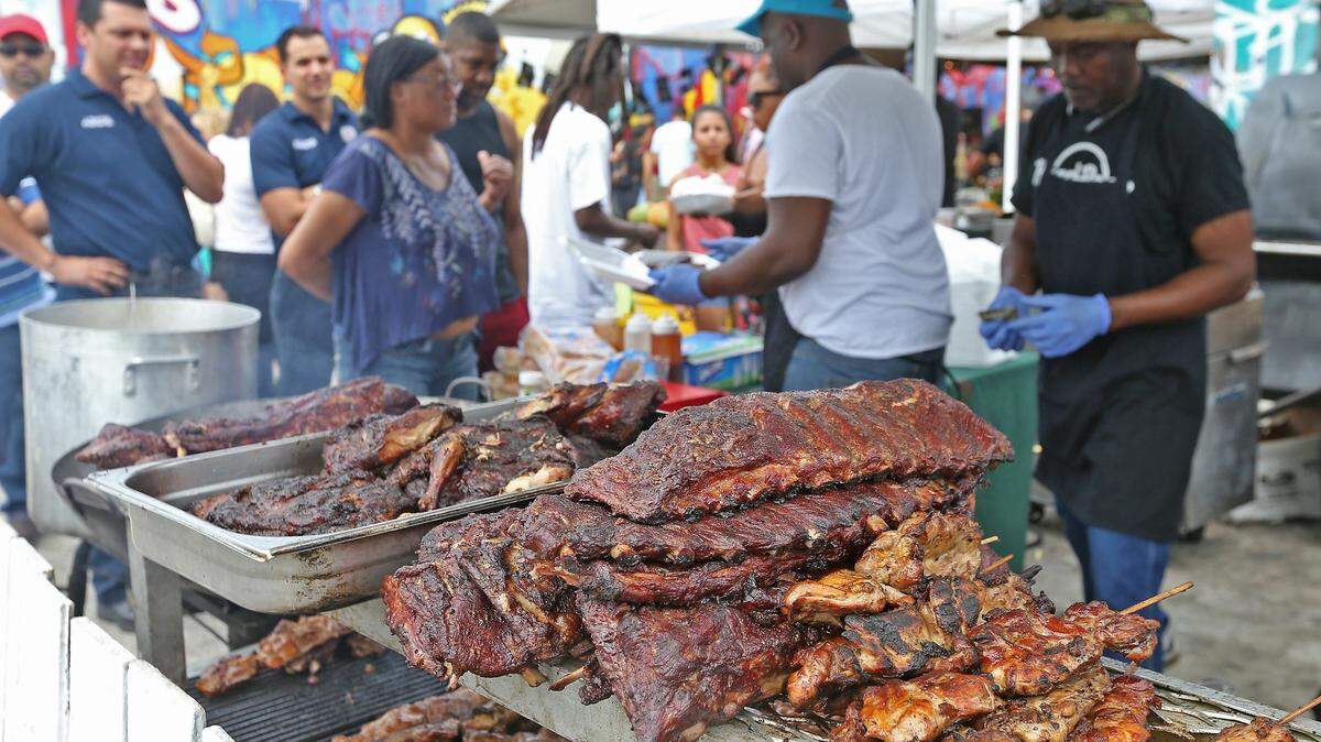 Some ribs and chicken are prepared by Eat Da Bone BBQ as Miami kicks off BBQ season for the whole family with Grillin N Chillin, the Miami BBQ Festival held in Wynwood on Sunday, April 3, 2016.