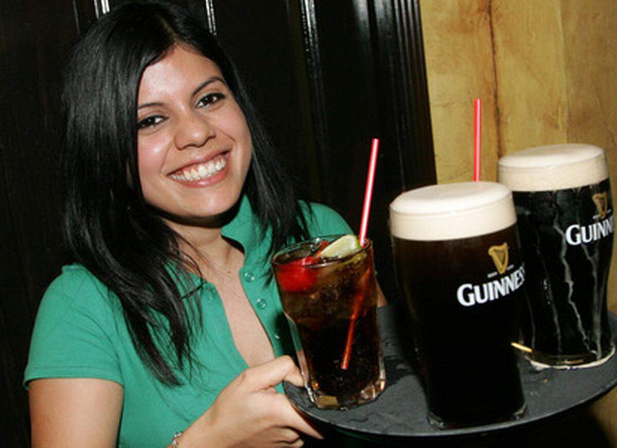Erika Jimenez serves up some drinks at The Irish Times Pub and Eatery, 5850 Sunset Dr., in South Miami. Photo: Joshua Prezant.