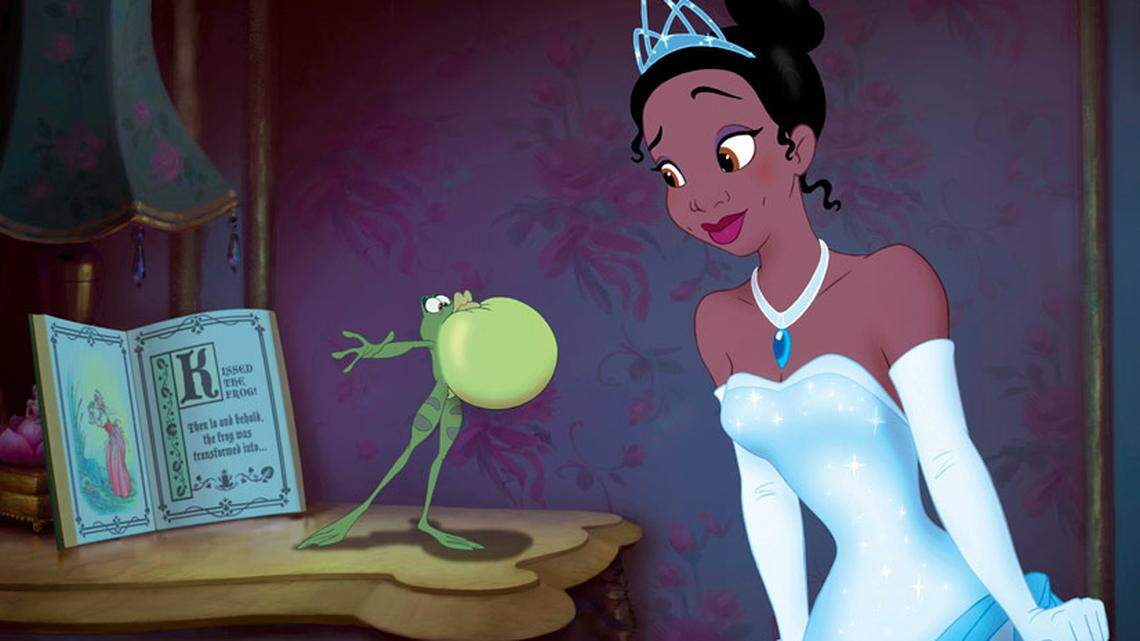 In this film publicity image released by Disney, Princess Tiana, voiced by Anika Noni Rose, right, is shown with frog Prince Naveen, voiced by Bruno Campos, in a scene from the animated film, "The Princess and the Frog." (AP Photo/Disney)