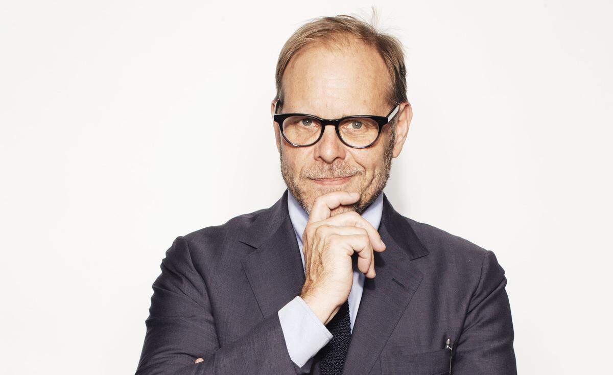 In this Oct. 26, 2016 photo, Alton Brown poses for a portrait in New York to promote his cookbook, "EveryDayCook: This Time Its Personal," and  a live Broadway variety show with a mix of unusual food demonstrations, puppets and songs.  (Photo by [Victoria Will]/Invision/AP)