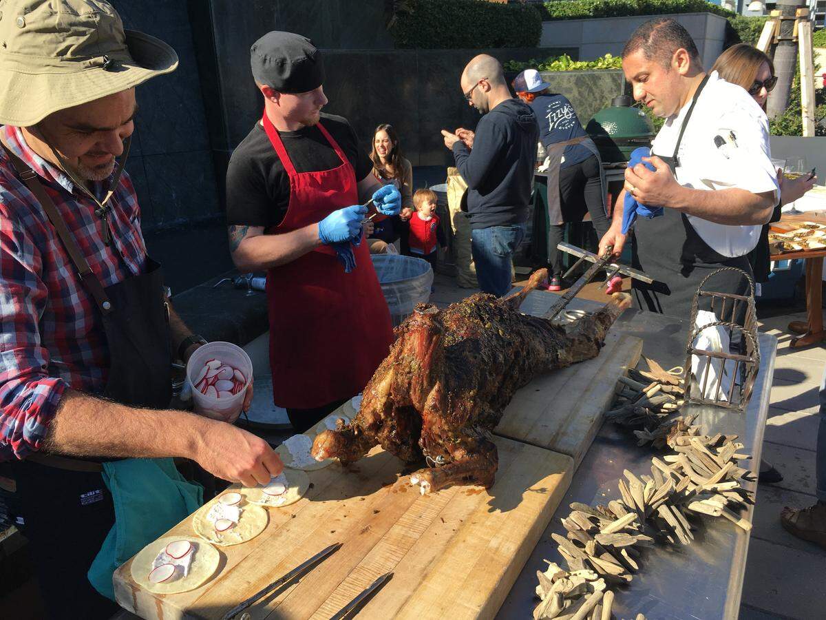 Edge Steak chef Aaron Brooks, in his Australian bush hat, will be flame-roasting meats at his barbecue with his "mates." (Handout)