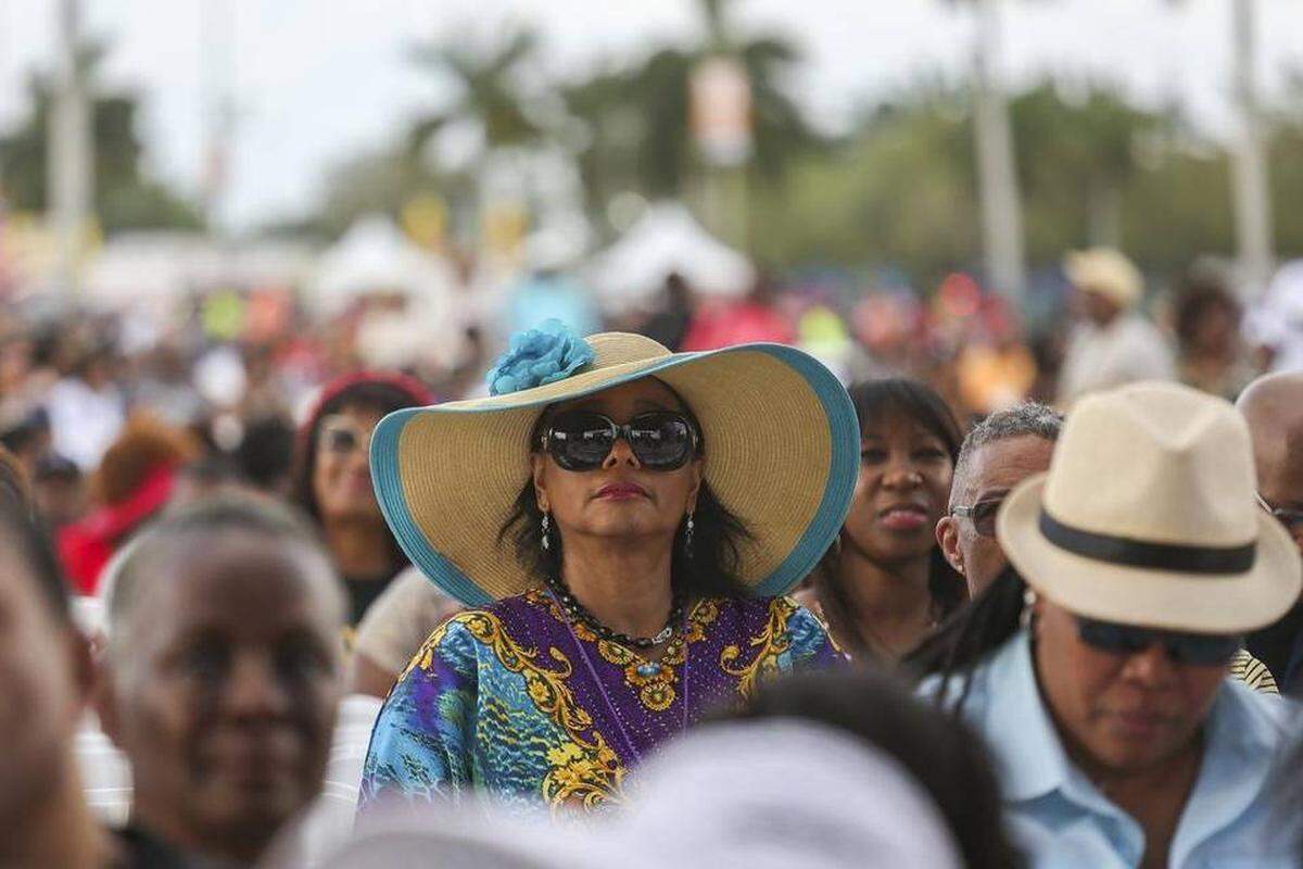 John Legend's mother, Phyllis Stephens, watches local artist, April Raquel and the Koture Funk, perform at the11th annual Jazz in the Gardens Music Festival in Miami Gardens on March 19, 2016.