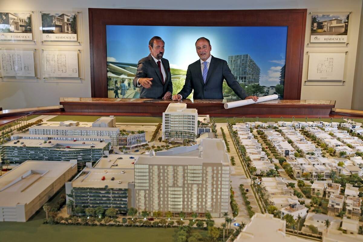 Jorge Perez, CEO and Chairman of Related Group, left, with Steve Patterson, President of Related Development, at the sales center for CityPlace Doral on Monday, March 23, 2015. Oasis Park Square sales center is at 3470 NW 82nd Avenue, Suite 108 Doral, FL 33122