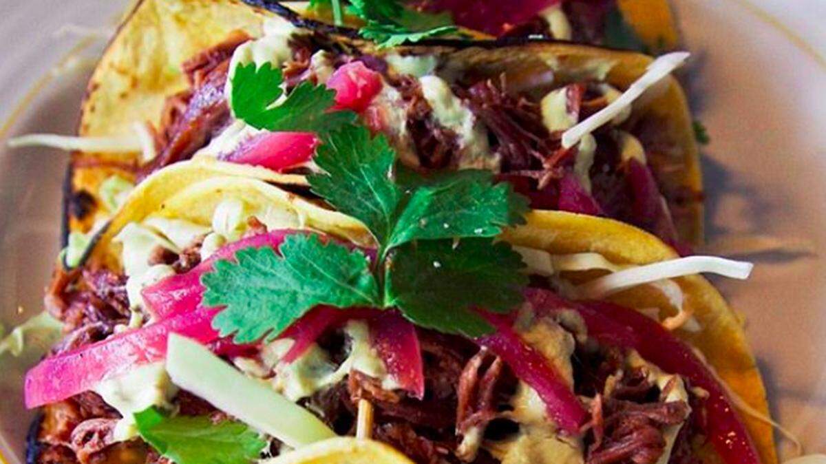 Tacos with grilled tortilla shells are part of the menu at the new Black Sheep in Little Haiti.