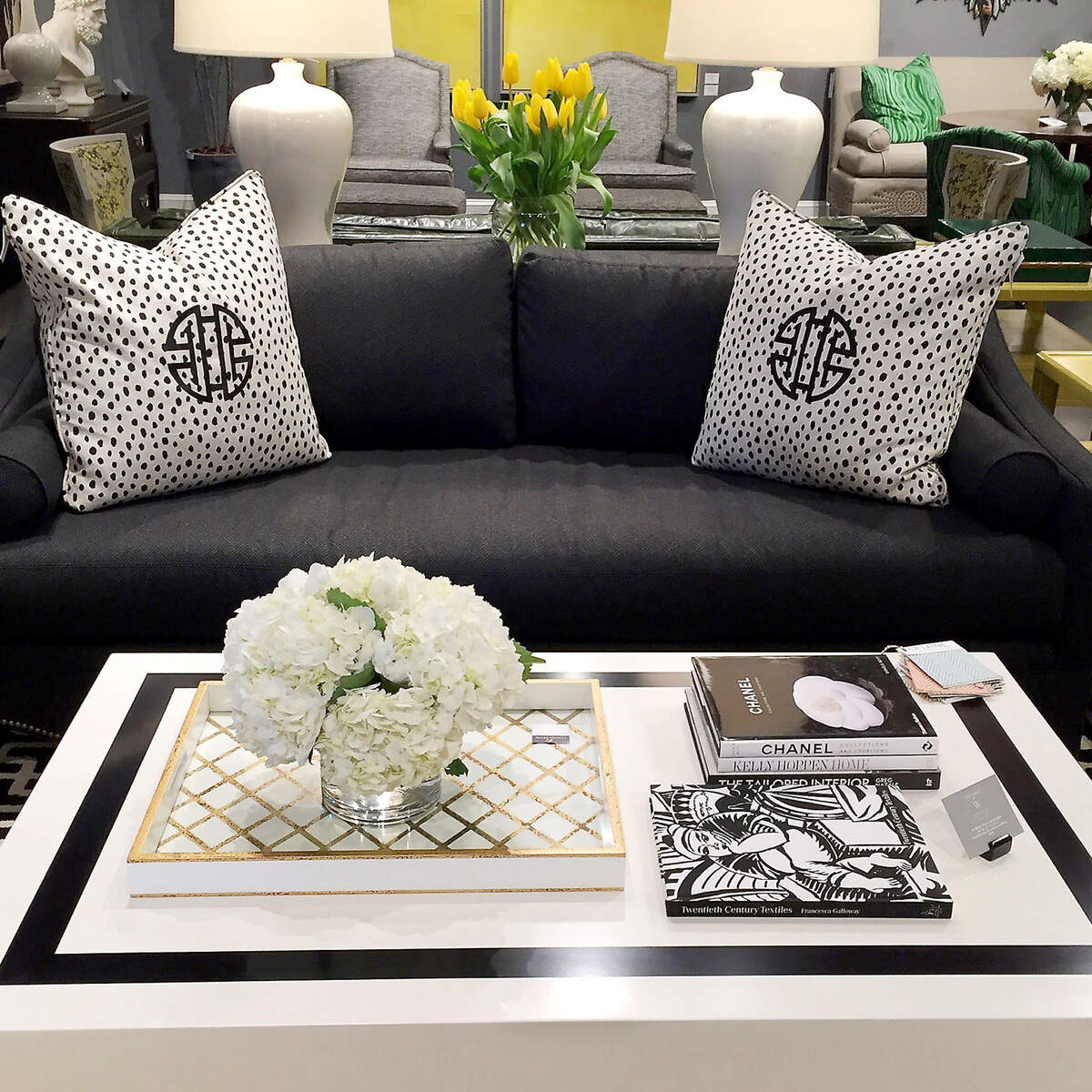 A Tobi Fairley coffee table is paired with her Eva sofa for C.R. Laine in Derek Onyx fabric. (Patricia Sheridan/Pittsburgh Post-Gazette/TNS)