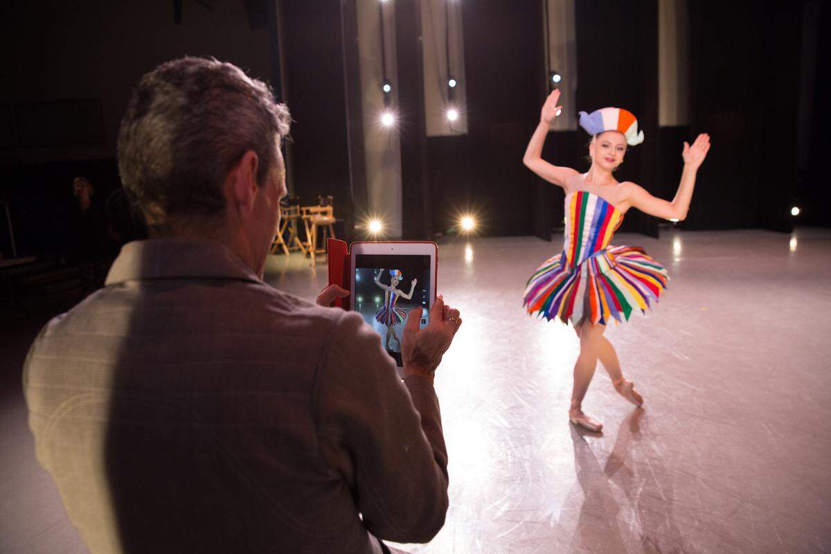 Ruben Toledo takes photos of a Miami City Ballet dancer posing in the costumes designed by his wife, fashion designer Isabel Toledo.