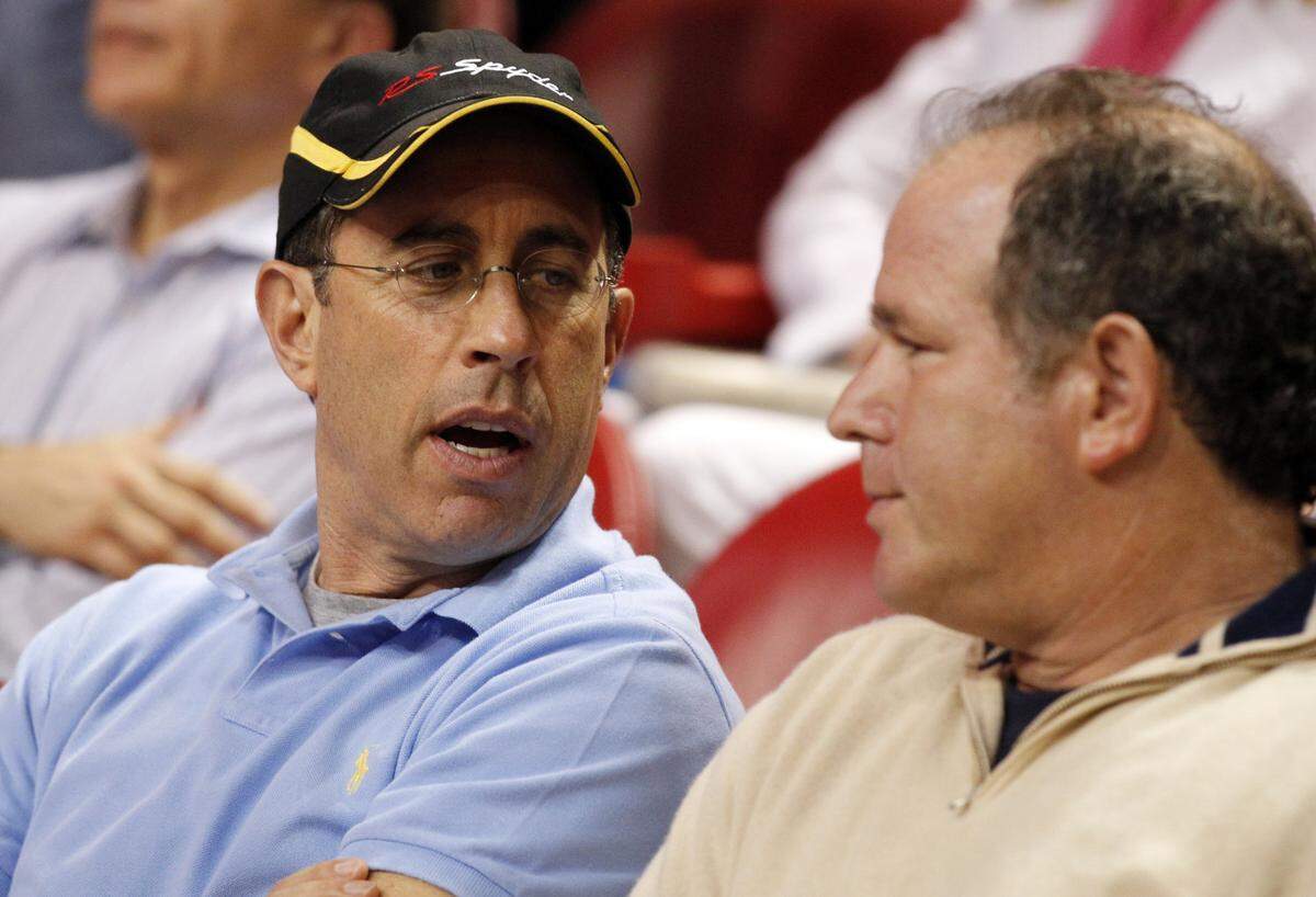 Miami Heat play the Phoenix Suns as Jerry Seinfeld sit in the stands at the AmericanAilrines Arena in Miami, Florida, March 20, 2012.