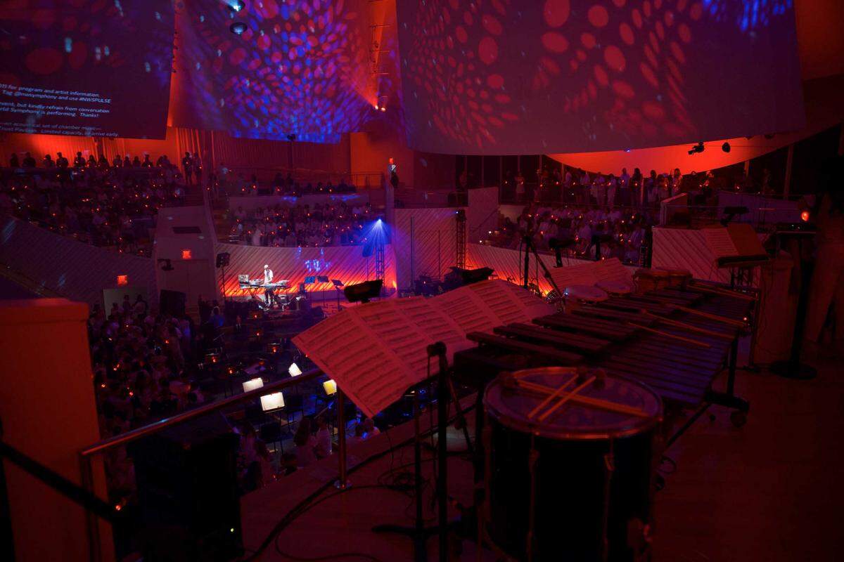 DJ Le Spam lends his mixing skills to the late night party with the New World Symphony.