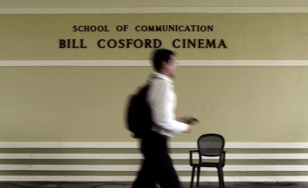 A student walks past the Bill Cosford Cinema at the University of Miami (Patrick Farrell/Miami Herald)